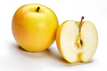 a whole flesh yellow-red orin apple  covered with small water droplet and another half isolated in white background with clipping path