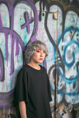 person with graffiti