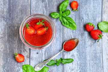 Home made ketogenic   organic  bio strawberry jam and fresh strawberryes  on wooden background. 