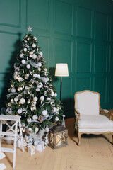 Christmas decor in a room with green walls