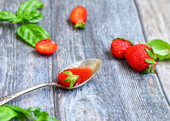 Home made ketogenic   organic  bio strawberry jam and fresh strawberryes  on wooden background. 