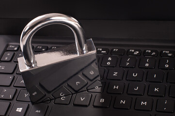 Cyber crime. Internet cyber security concept with a padlock on laptop computer. Ransomware, Malware, Encrypt and Hacking. Data security concept