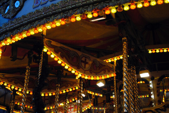 Abstract View of Coloured lights on Outdoor Fairground Ride 