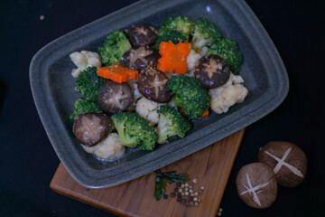 stir fried vegetables on wood table. Healthy asian food concept