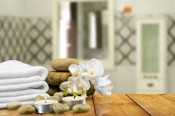 Fototapeta na wymiar Spa concept with candles, natural organic soaps, towels for skin treatments