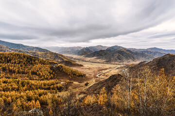 View of the autumn mountains and the Chui tract from the Chike-Taman pass. Altai Republic, Russia