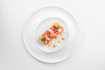 Salmon Tartar with avocado Gourmet Food Starter isolated on white background