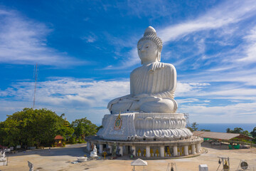 Fototapeta premium aerial view big cleaning on white big Phuket Buddha. white big Phuket Buddha in blue sky..Big Buddha, another tourist attraction of Phuket .that has been quiet during the Covid-19 epidemic.