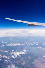 Fototapeta premium Wing of an airplane in the sky.