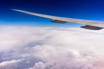 Wing of an airplane in the sky.