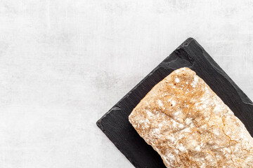 Freshly backed bread top view. Bakery background