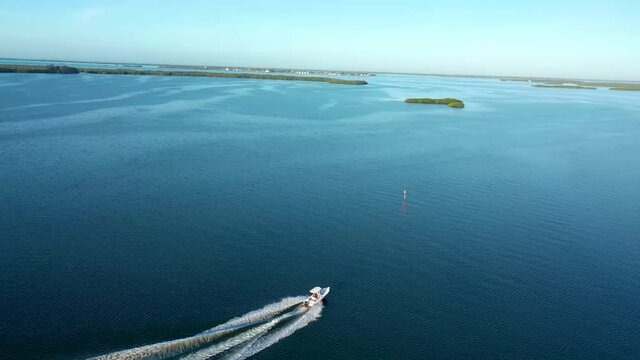 boat going off to sea  aerial