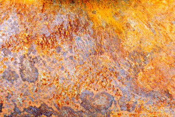 Rusty surface of a metal sheet close-up. Corrosion steel and iron texture.