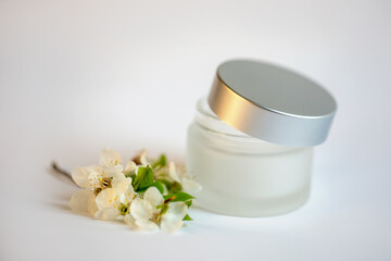 Fototapeta na wymiar jar of cream on a white background