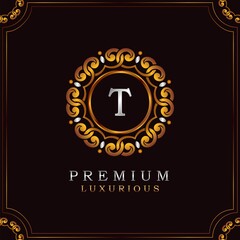 Golden Premium Luxury Mandala Badge Letter T Logo Design. Elegance Ornate Decoration Mandala Badge On Golden Frame .