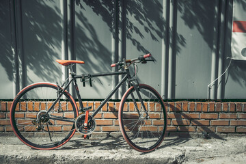 Fototapeta na wymiar old bicycle parking on vintage urban street