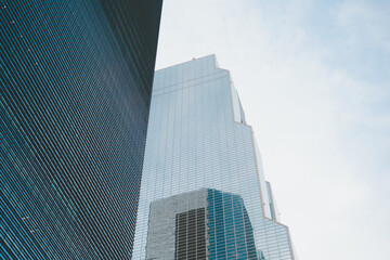 low and wide angle view with high mirror building with sky