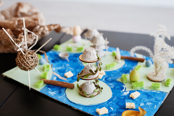High angle background image of handcrafted school projects on table for biology class, copy space