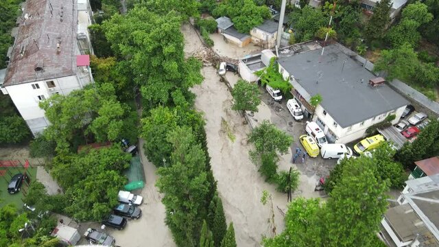 Stream of water from the mountains on the city streets