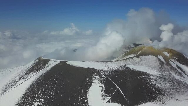Mount Etna on Sicily Island, Italy. Aerial view of Etna volcano in winter, January 2019.