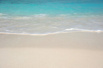 Fototapeta na wymiar white sand beach with sea water