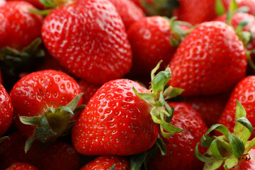 Fresh tasty strawberry on whole background, close up