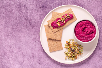 beetroot hummus, sprouted grains and whole grain crisps