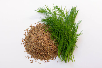 Dill seeds on a white background.
Healthy products concept.