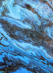 Black and blue streaks of paint. Abstract background with marble effect