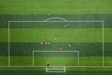 Aerial shots of football players scoring a goal