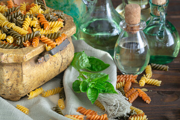uncooked Italian rotini pasta, raw food texture close up
