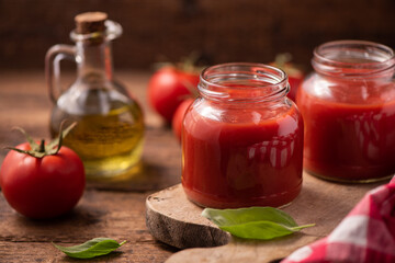 Traditional homemade tomato sauce and tomatoes
