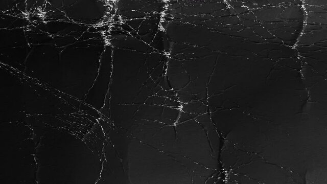 Abstract grunge textured wrinkled surface. Crumpled vintage abstract texture. Stop motion. Horror creepy background.