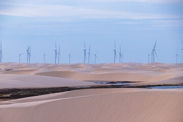 Wind farm between desert dunes in Brazil