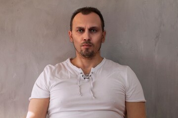 Obraz premium portrait of a brutal man with a stern look