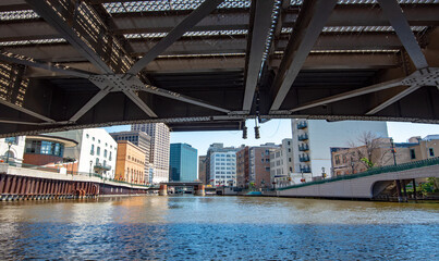 Cityscape View from the River from Under a Drawbridge