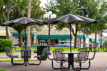 Tables and umbrellas in the park