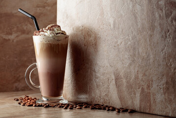 Milk coffee cocktail with whipped cream.