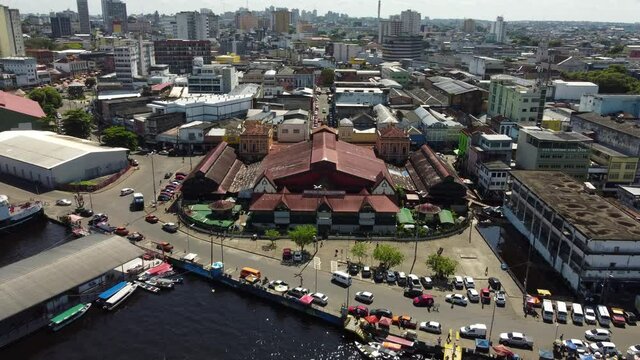 Aerial view of the public municipal market Adolpho Lisboa, located in central Manaus, Amazonas state, Brazil. Negro River is seen in the bottom.