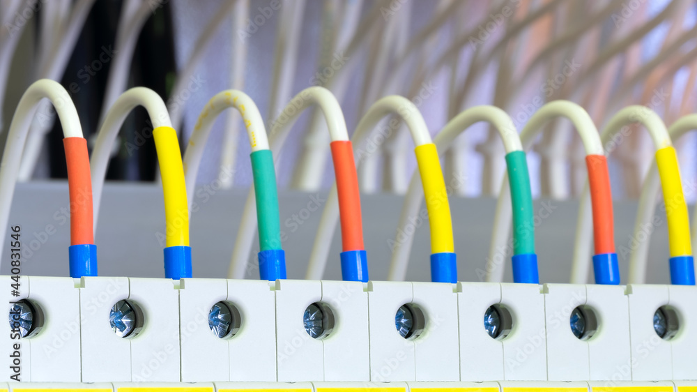Aufkleber color wires in a box of distribution of an electricity, plc control panel with wiring, lectric contr