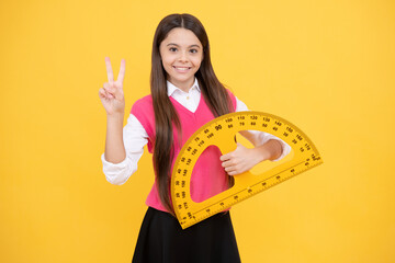 start the brain engine. angle degree measurement. happy teen girl hold ruler. back to school.