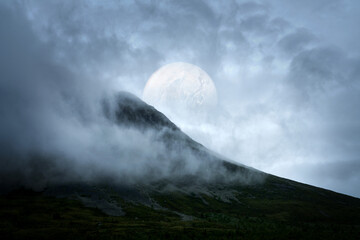 Digital art. Natural landscape with fog and mystical planet or moon.