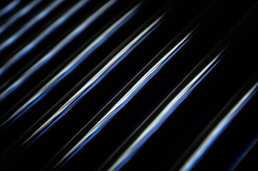abstract dark black background with shiny metallic lines