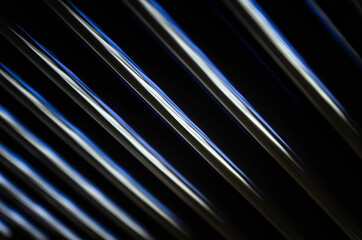abstract dark black background with shiny metallic lines