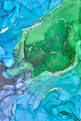 Alcohol ink art.Mixing liquid paints. Modern, abstract colorful background, wallpaper. Marble texture.Translucent colors