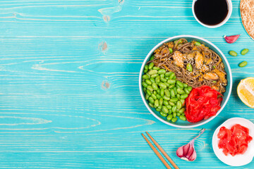 Poke with buckwheat soba noodles with mussels, edamame beans and pickled ginger. A bowl of noodles...