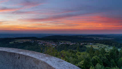Colourful sunset in the northern Black Forest with a view of the villages of Freiolsheim,...