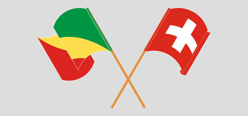 Crossed and waving flags of Republic of the Congo and Switzerland