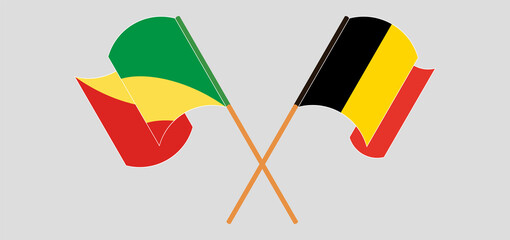 Crossed and waving flags of Republic of the Congo and Belgium