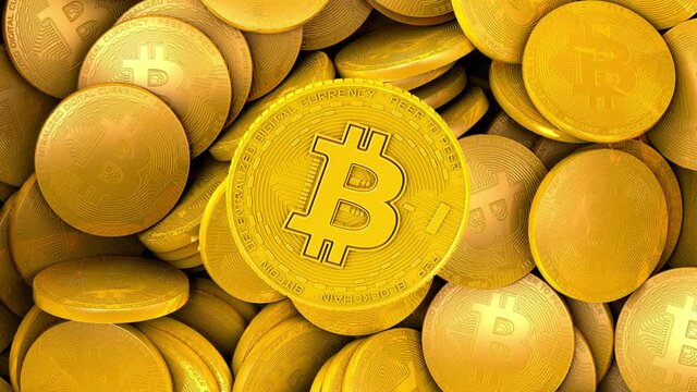 Bitcoin Falls Into A Pile Of Bitcoins. view follows a bitcoin spinning from above and landing on a pile of other coins